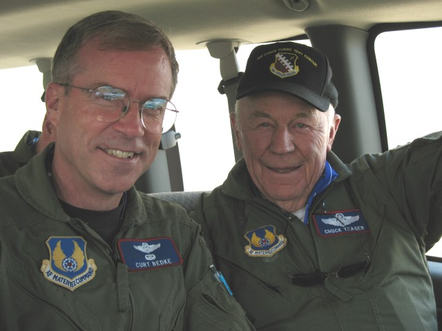Curt Bedke and Chuck Yeager in a Bus