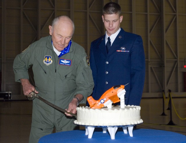 Chuck Yeager Cutting the Cake
