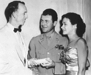 Glennis and Chuck Yeager with the President